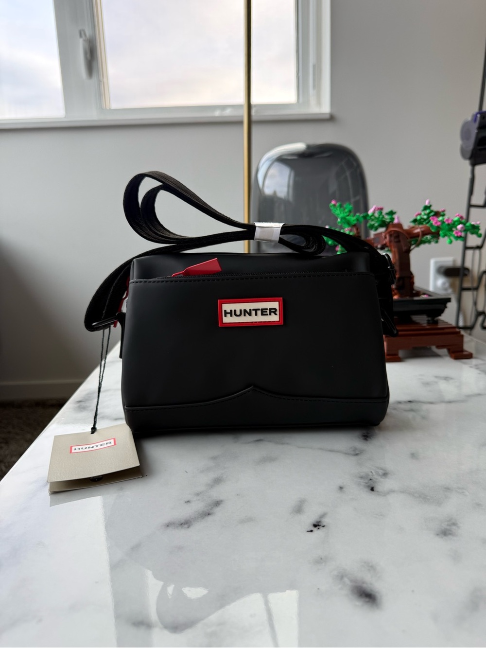 Hunter Black Messenger Bag with Red Accents